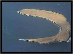 Molokini - Screen cap from a video shot from an airplane.