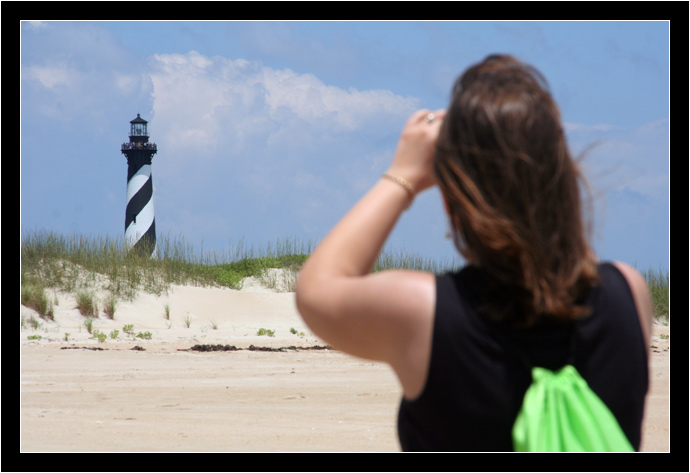 Oksana taking a picture of the Hatteras Lighthouse